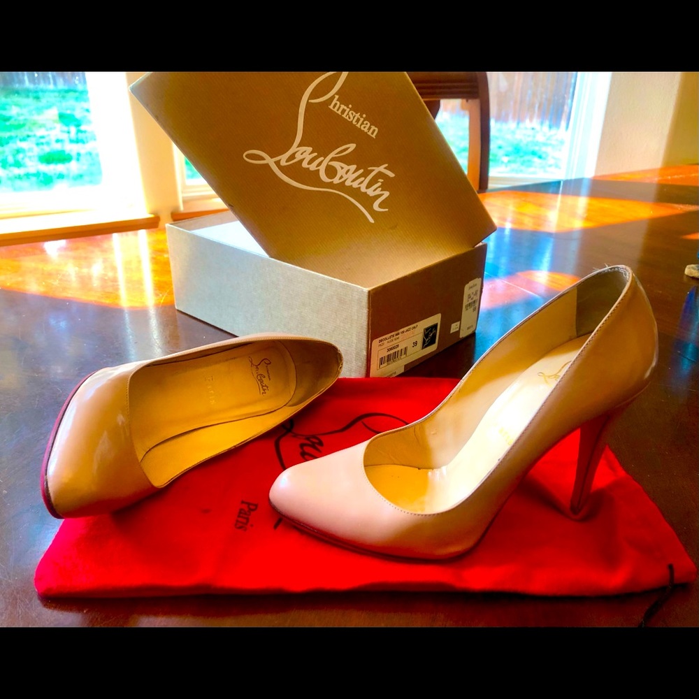 Christian Louboutin Jazz Calf nude heels.